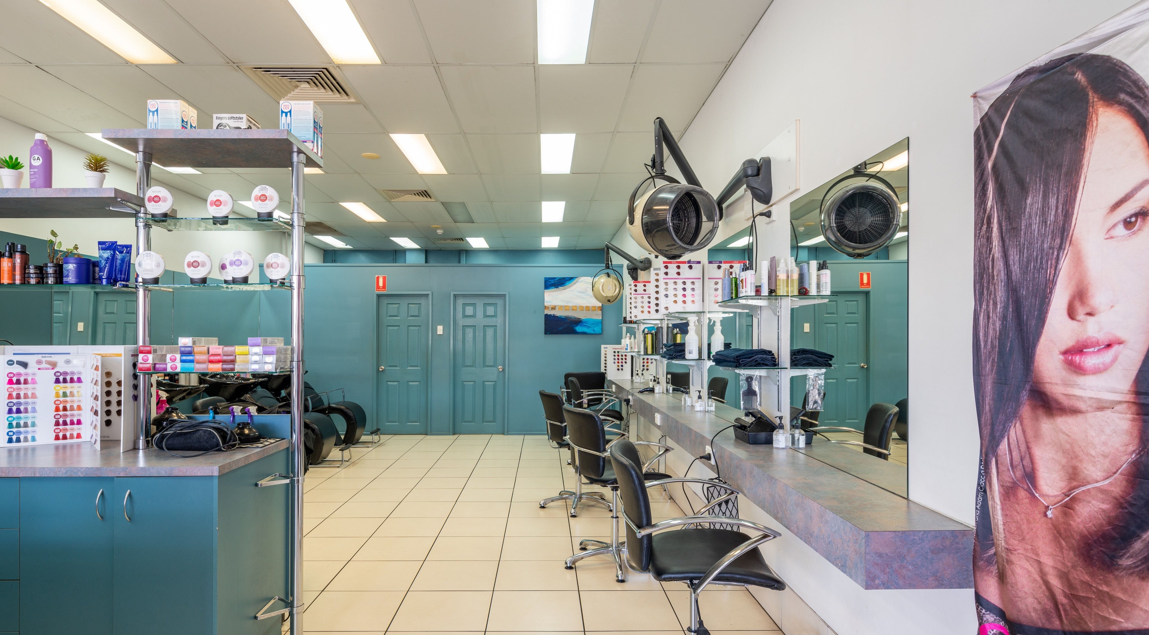 Modern interior of Plainland | Gaye's Hair Fashions in Plainland, Queensland, AU, featuring styling stations.