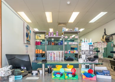 Interior of Plainland | Gaye's Hair Fashions showing vibrant products and salon setup in Plainland, Queensland, AU.