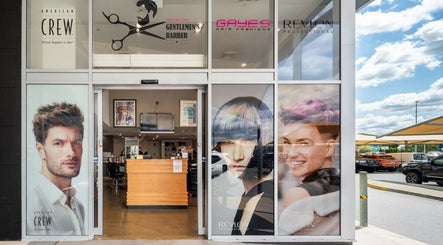 Entrance to Riverlink - Gaye's Hair Fashions, North Ipswich, Queensland, AU with vibrant window displays.