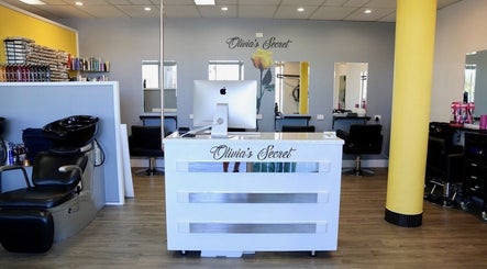 Reception at Olivia's Secret Hair and Beauty in Buddina, Queensland, AU featuring stylish decor and salon stations.