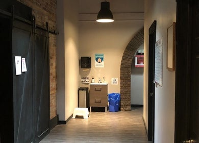 Welcoming hallway at Mindful Massage, Pembroke, Ontario, CA featuring soft lighting and modern decor.