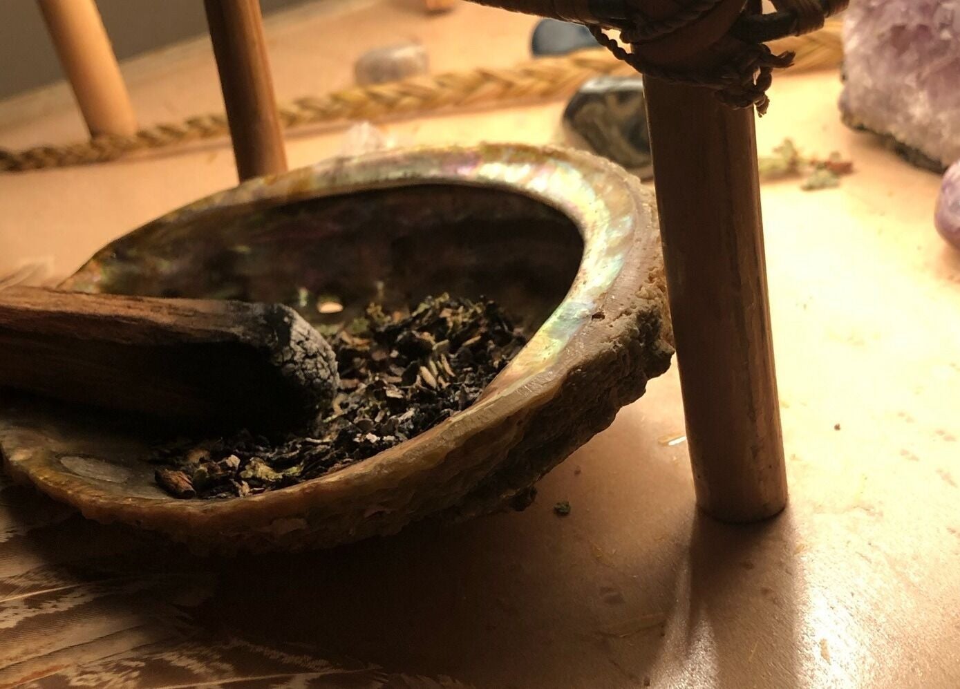 An abalone shell with herbs at Mindful Massage, Pembroke, Ontario, CA, creating serene aromatherapy vibes.