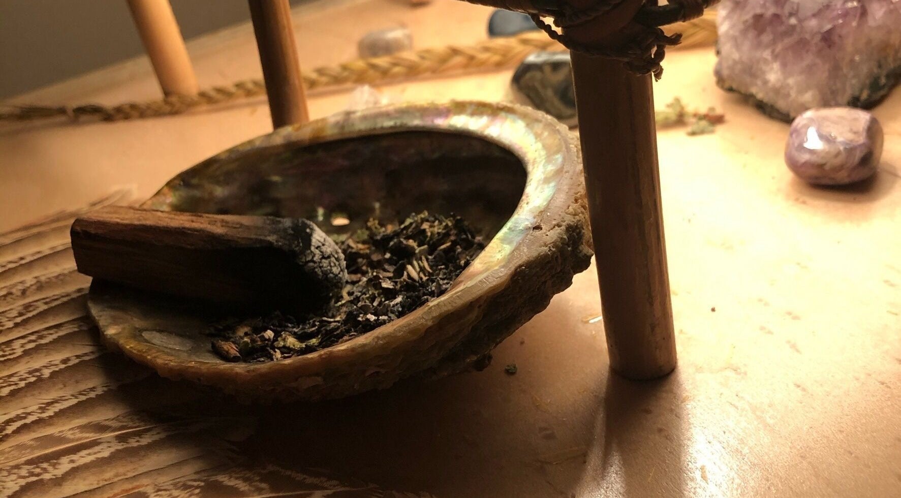 An abalone shell with herbs at Mindful Massage, Pembroke, Ontario, CA, creating serene aromatherapy vibes.