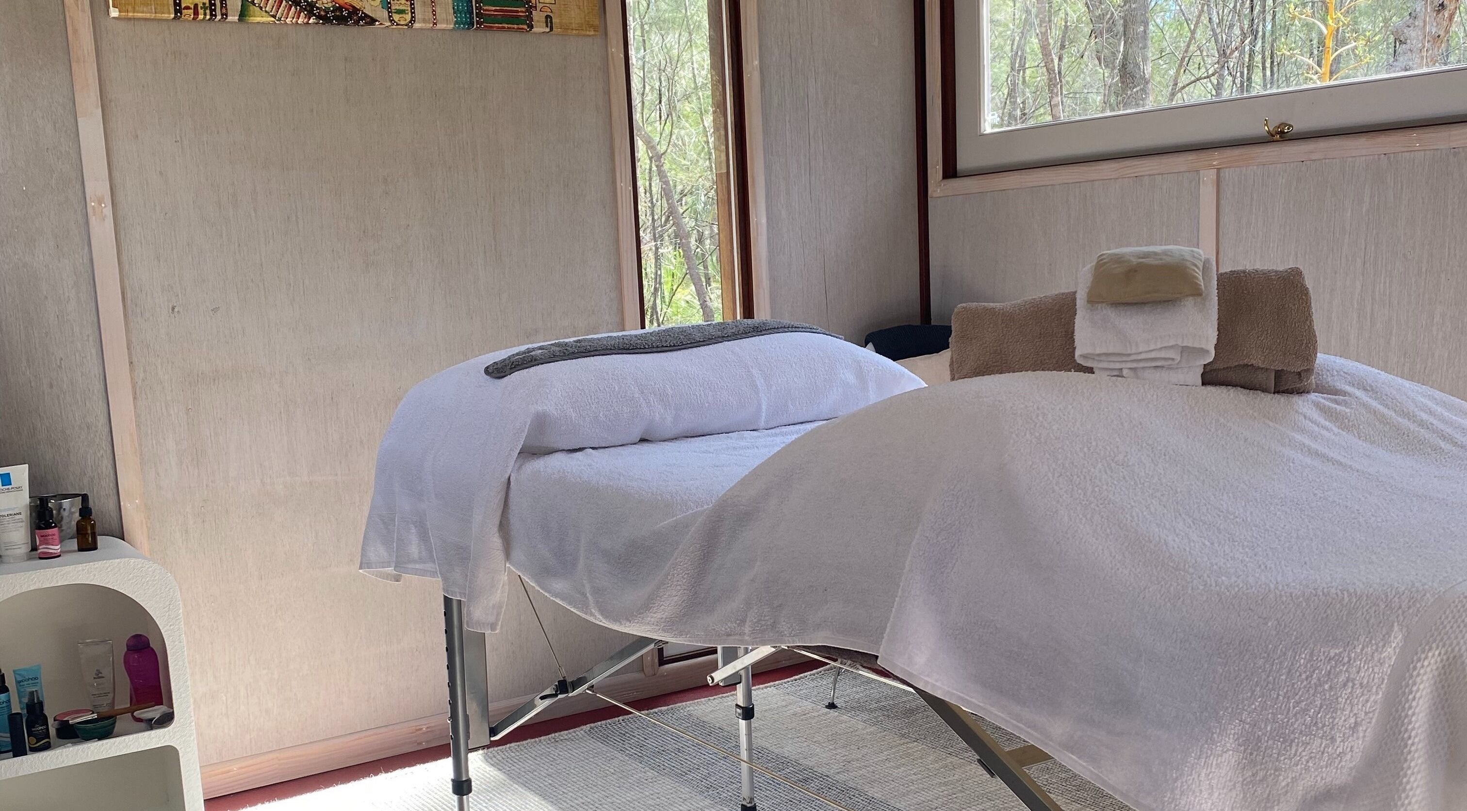 Peaceful spa room at Reflect Mobile Spa Agnes Water, Queensland, AU with massage table and towels ready.