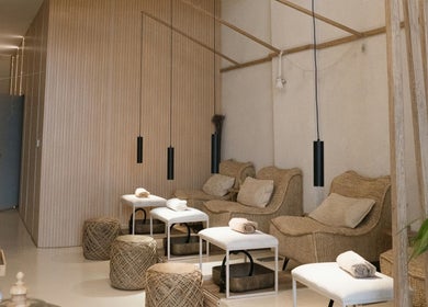 Relaxing seating area at Le Senes Spa, Riyadh, Riyadh Province, SA with natural decor and soft lighting.