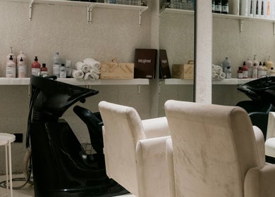 Hair salon station with products at Le Senes Spa, Riyadh, Riyadh Province, SA, featuring stylish decor.