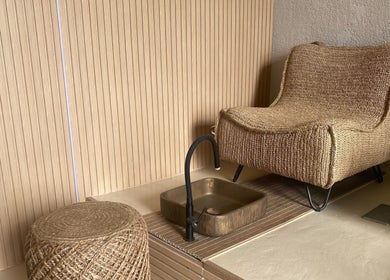 Relaxing woven chair and footbath setup at Le Senes Spa, Riyadh, Riyadh Province, SA.