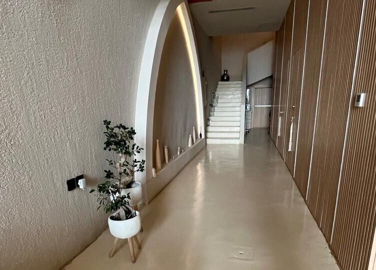 Elegant hallway at Le Senes Spa, Riyadh, Riyadh Province, SA, showcasing minimalist design and decor.