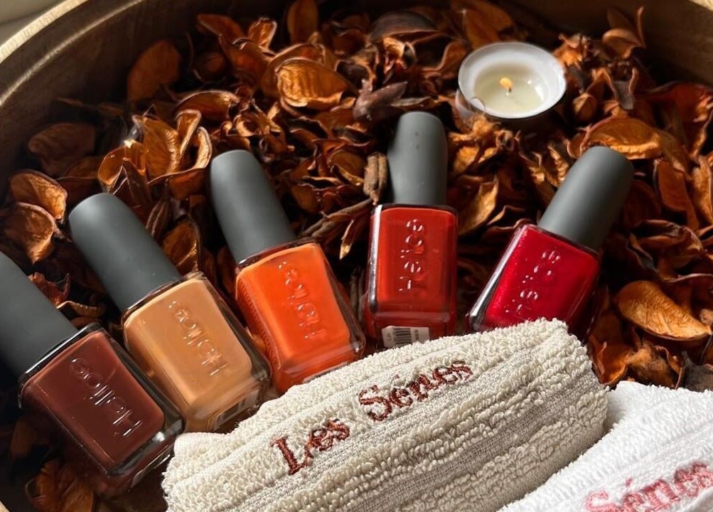 Nail polishes in warm tones with Le Senes Spa towel, Riyadh, Riyadh Province, SA.