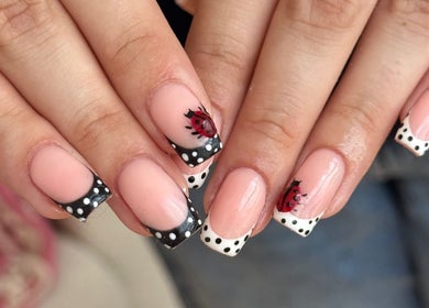 Intricate ladybug and polka dot nail art at Beauty by Lucy Elizabeth, Stoke-on-Trent, England, GB.