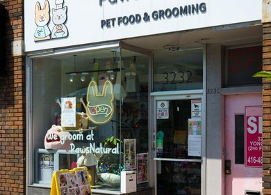 Storefront of PawsNatural Pet Store in Toronto, Ontario, CA showcasing pet grooming services.