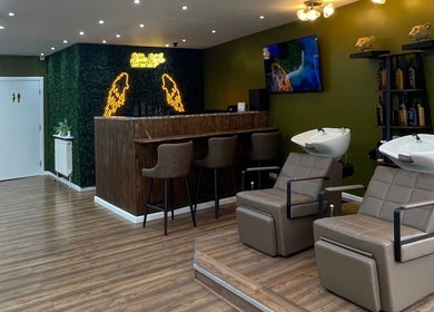 Stevostyle Hair Beauty in London, England, GB features a modern interior with stylish washing stations and bar stools.