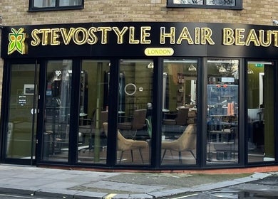 Exterior of Stevostyle Hair Beauty in London, England, GB, showcasing modern salon entrance.