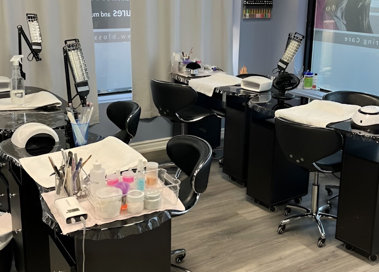 Modern nail stations at Luxe Salon & Spa in Brampton, Ontario, CA, showcasing a sleek, professional setup.
