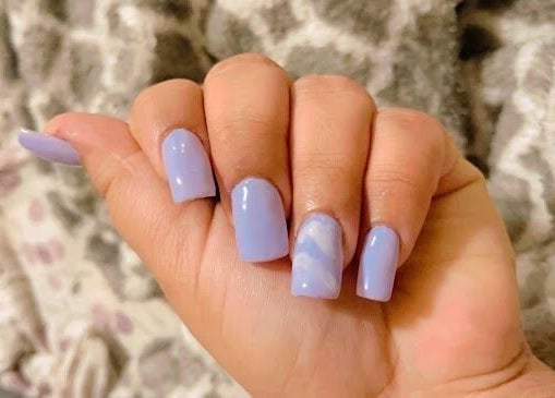 Lavender nail art at Luxe Salon & Spa, Brampton, Ontario, CA showcases chic style and precision.