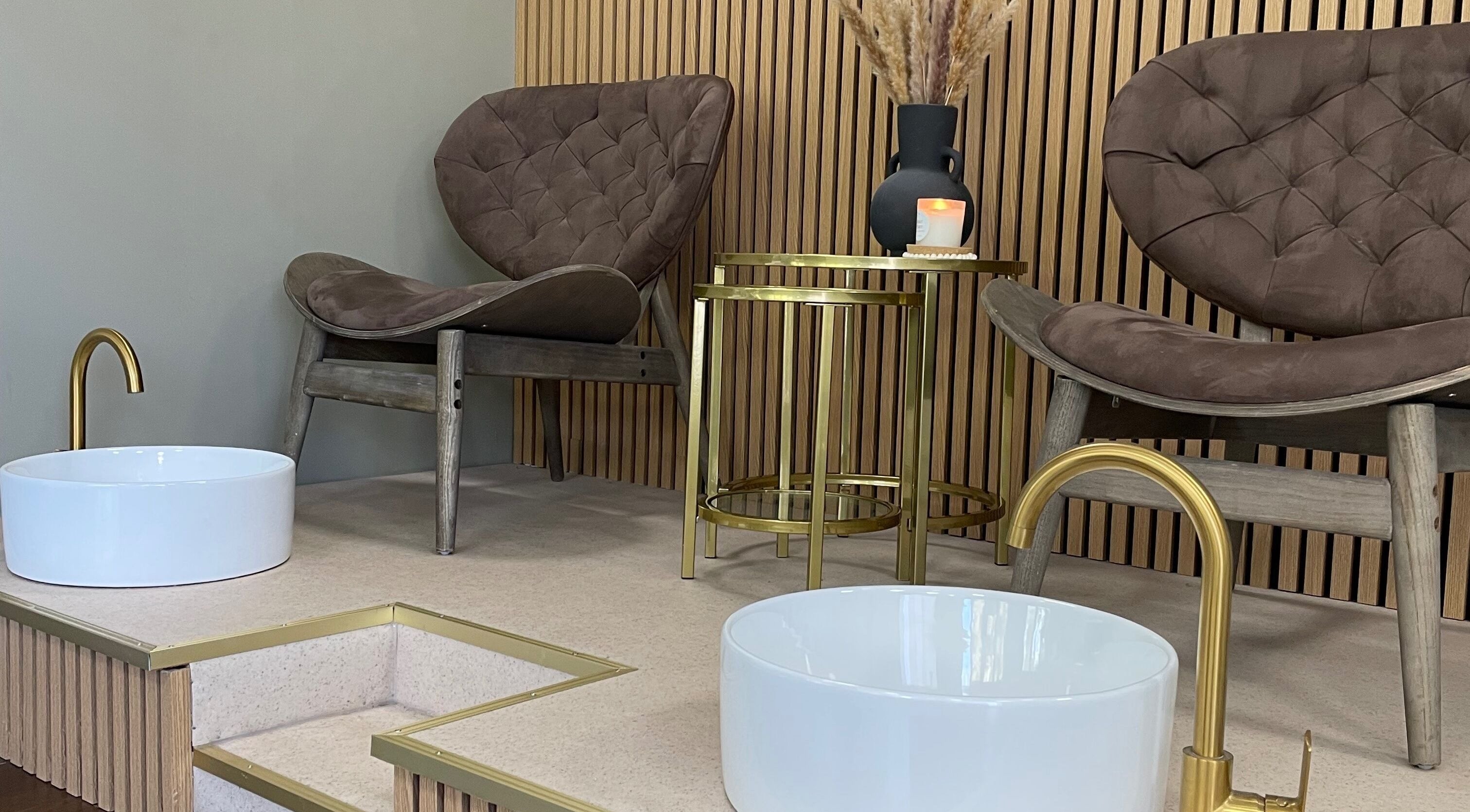 Worth Beauty's luxe pedicure chairs in Cleckheaton, England, GB with stylish decor and gold accents.