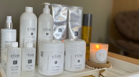 Worth Beauty's premium Elim products and candle setting in Cleckheaton, England, GB.