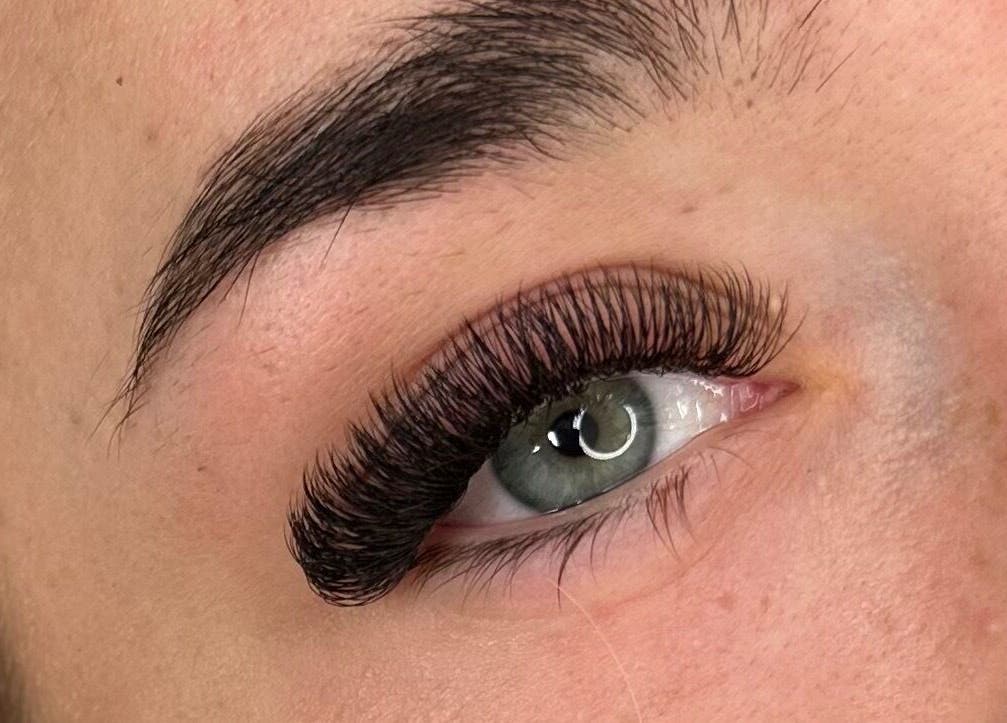 Close-up of eye with lush lashes from Lashes by Olivia Niamh in Dartford, England, GB.