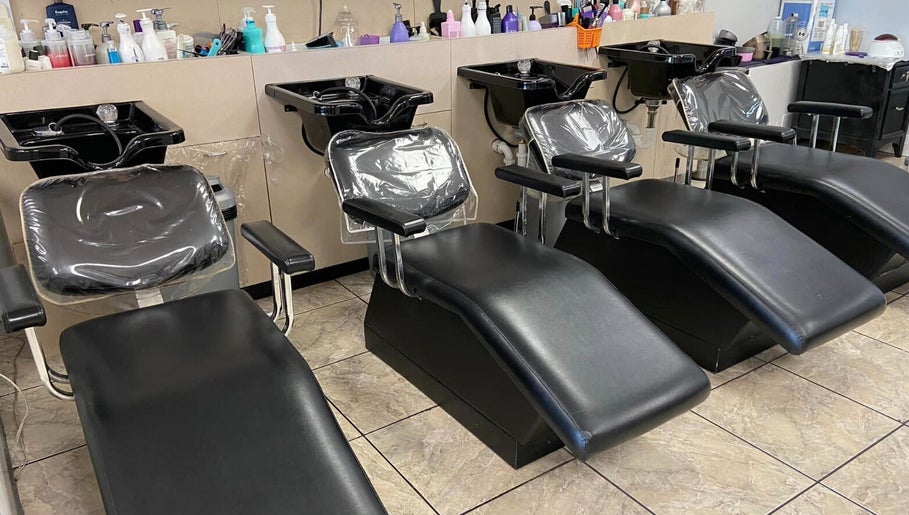 Luxurious shampoo chairs at Cutters Corner, Foley, Alabama, US, ready for a serene hair wash experience.