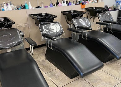 Luxurious shampoo chairs at Cutters Corner, Foley, Alabama, US, ready for a serene hair wash experience.