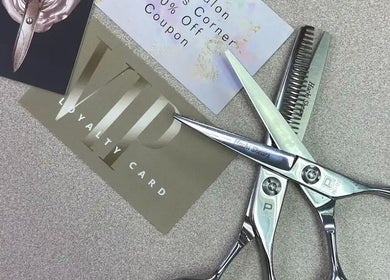 Professional hair shears and loyalty cards at Cutters Corner, Foley, Alabama, US salon.