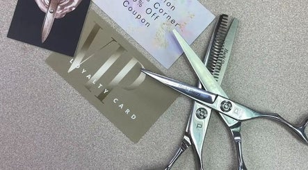 Professional hair shears and loyalty cards at Cutters Corner, Foley, Alabama, US salon.