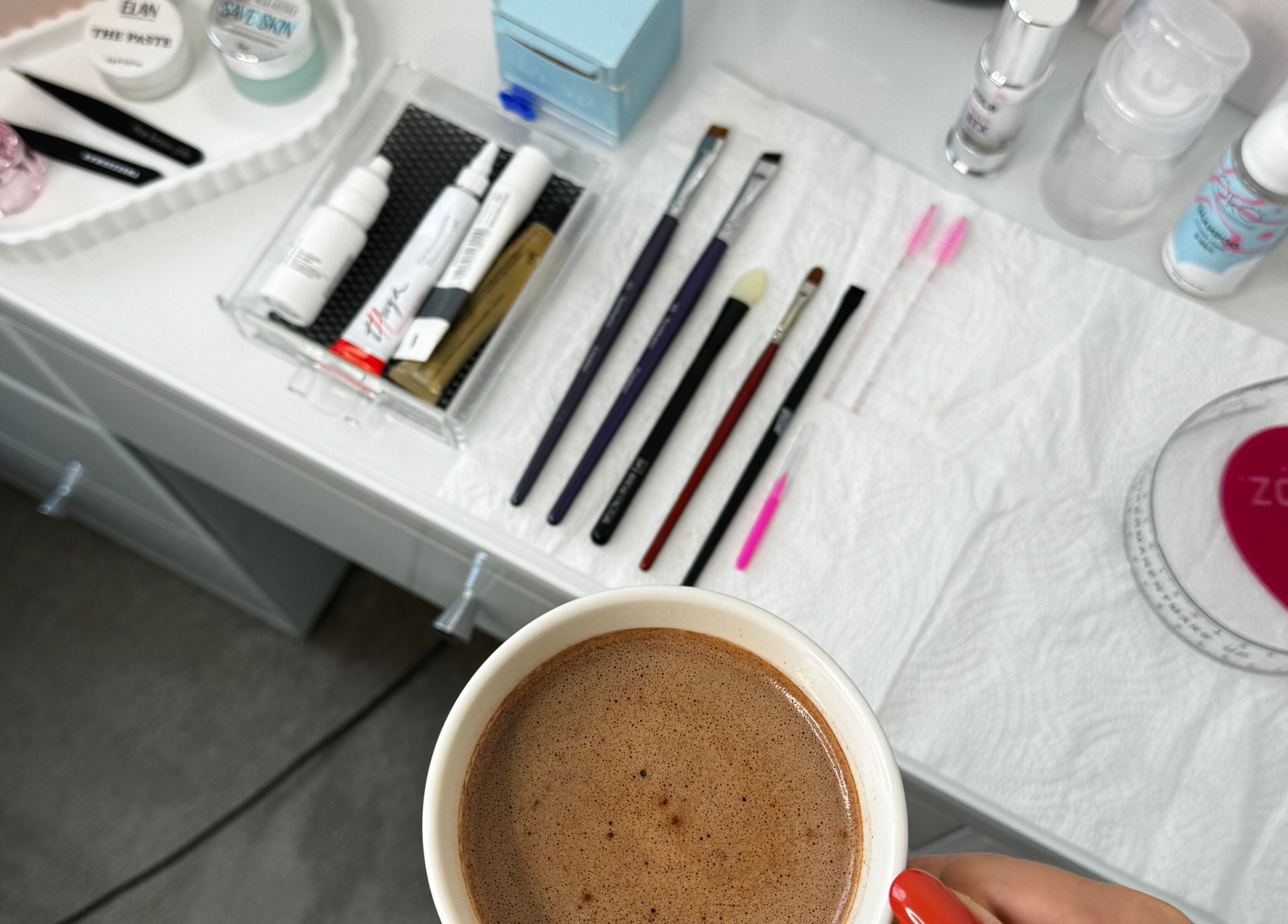 Beauty tools and coffee at Brows by Mel, Watford, Watford, GB. The perfect setup for a relaxing session.
