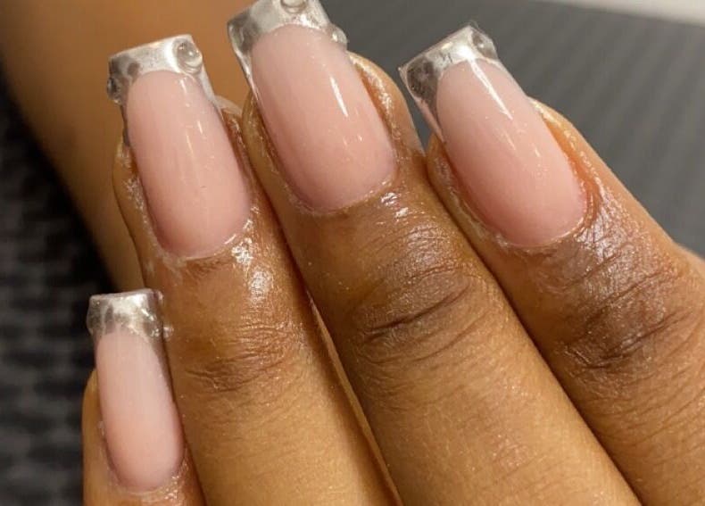 Elegant chrome-tipped nails by Nails by Ryan in Jos, Plateau, NG, showcasing refined nail artistry.