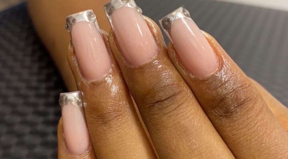 Elegant chrome-tipped nails by Nails by Ryan in Jos, Plateau, NG, showcasing refined nail artistry.