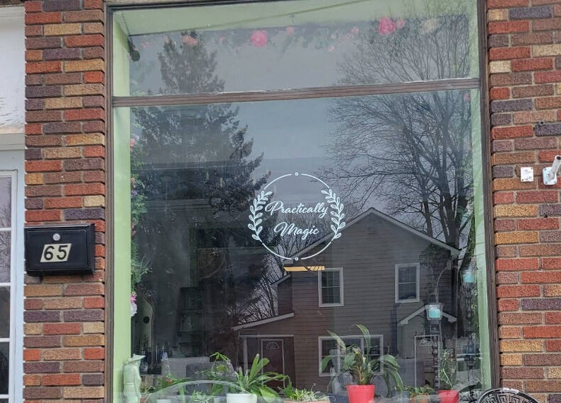 Practically Magic storefront with plants, located in South Glens Falls, New York, US.