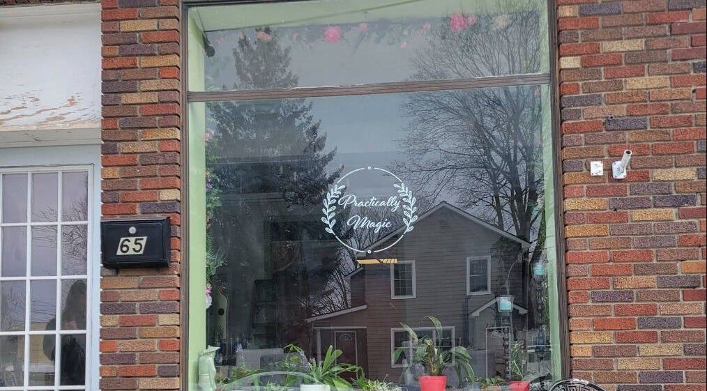 Practically Magic storefront with plants, located in South Glens Falls, New York, US.