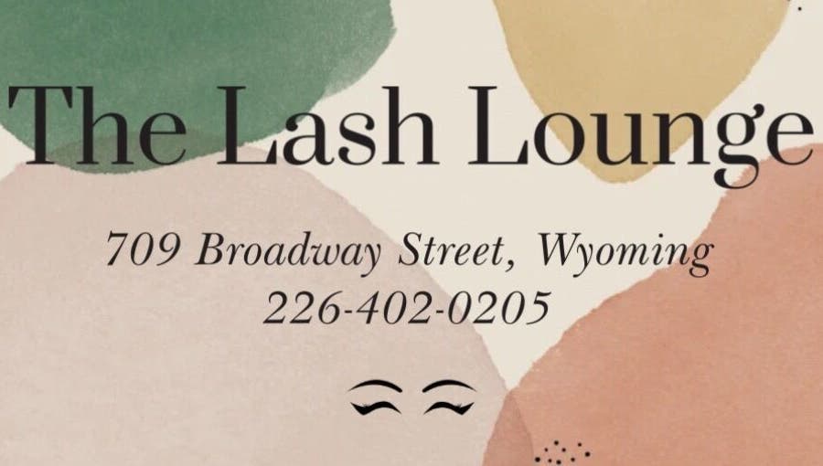 The Lash Lounge sign with address in Wyoming, Ontario, CA, showcasing contact details.