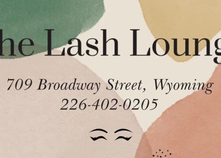The Lash Lounge sign with address in Wyoming, Ontario, CA, showcasing contact details.