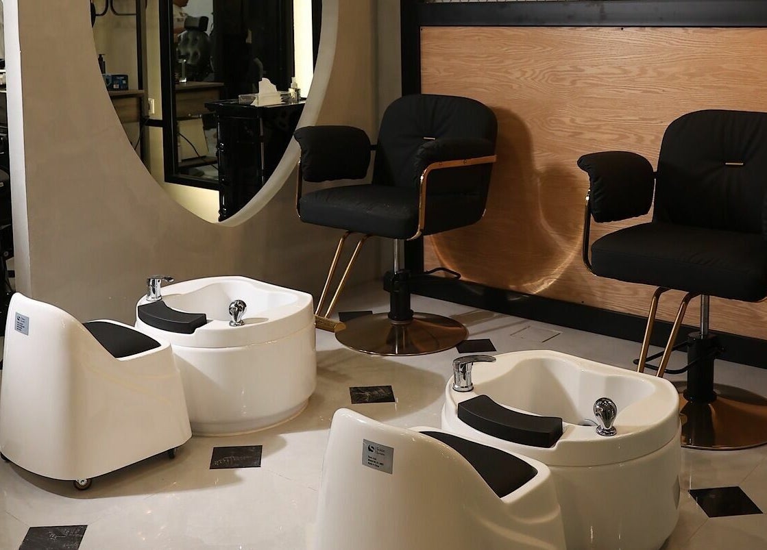 Elegant pedicure chairs and basins at Mirror Barbershop, Riyadh, Riyadh Province, SA, offering premium services.