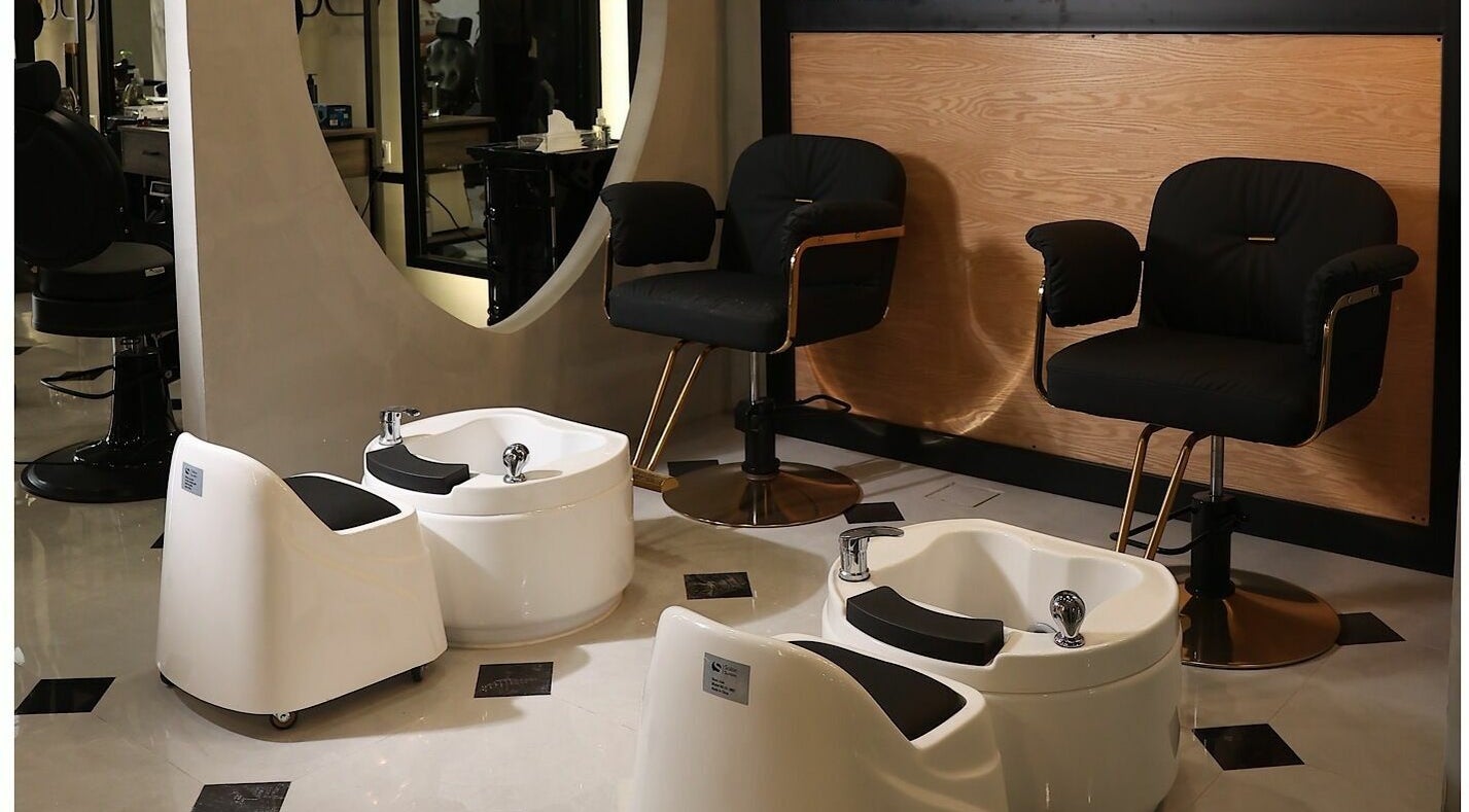 Elegant pedicure chairs and basins at Mirror Barbershop, Riyadh, Riyadh Province, SA, offering premium services.