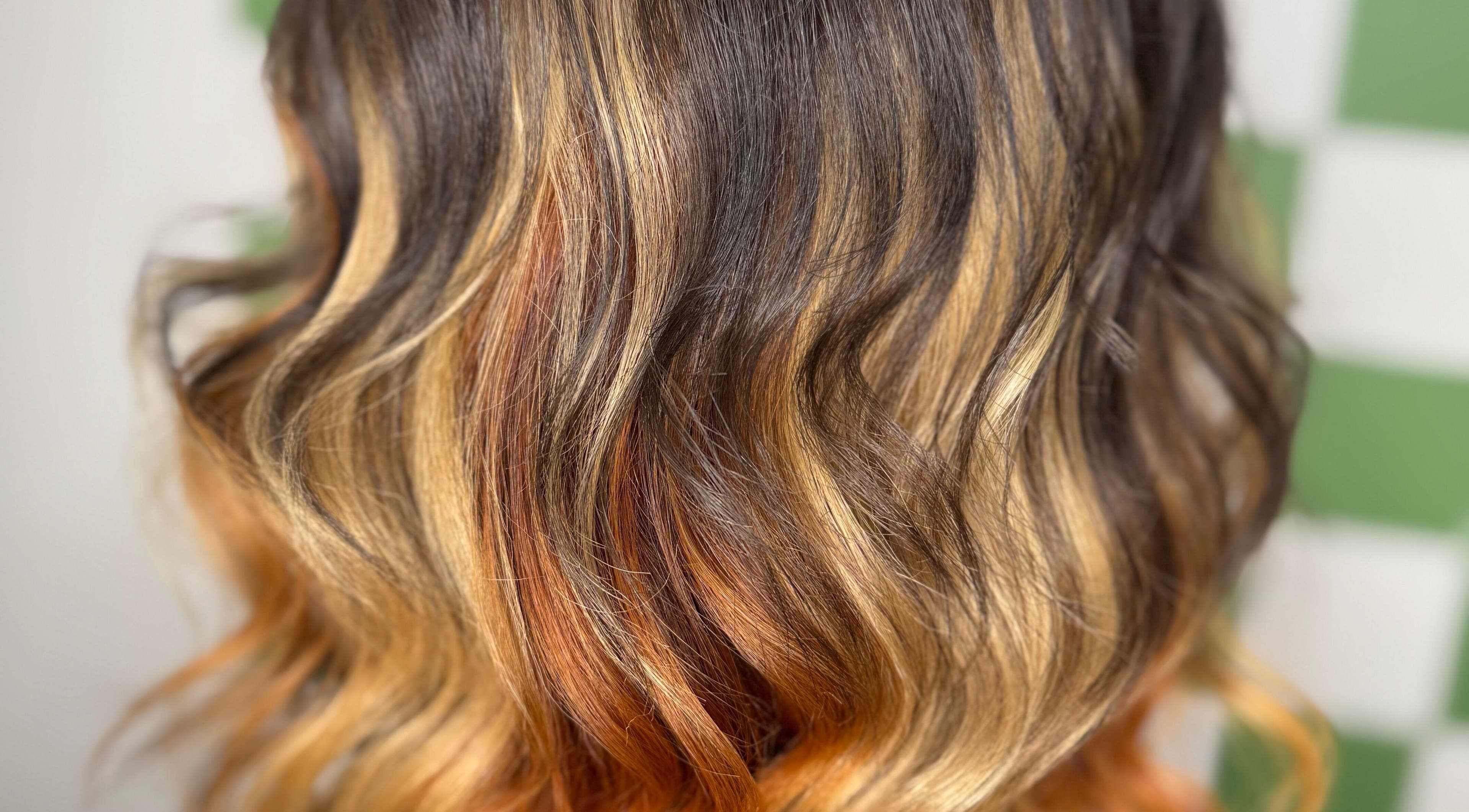Vibrant balayage waves at Hair Senpai in Campbelltown, New South Wales, AU, showcasing expert styling.