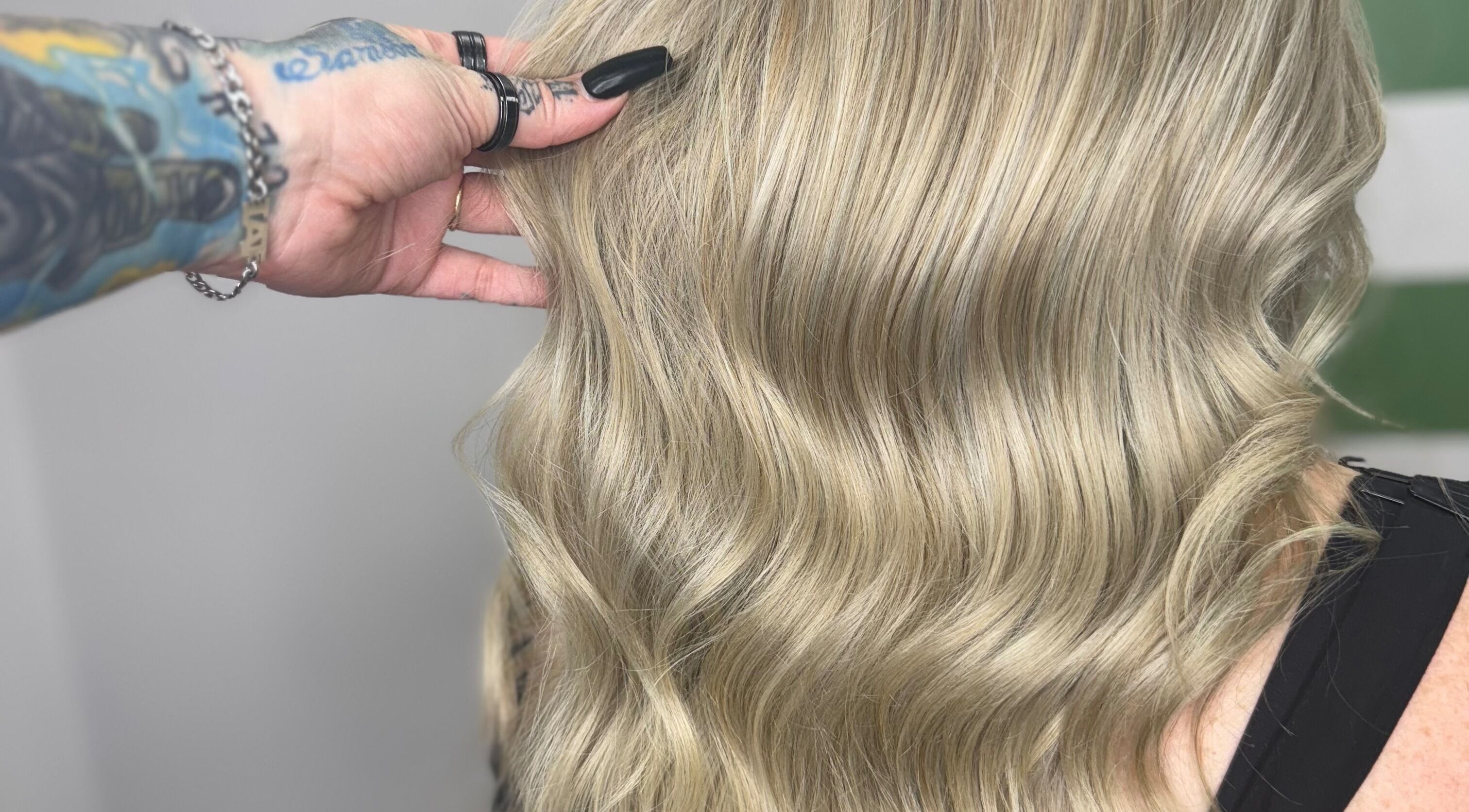 Stylish blonde waves expertly styled at Hair Senpai, Campbelltown, New South Wales, AU showcasing vibrant color.