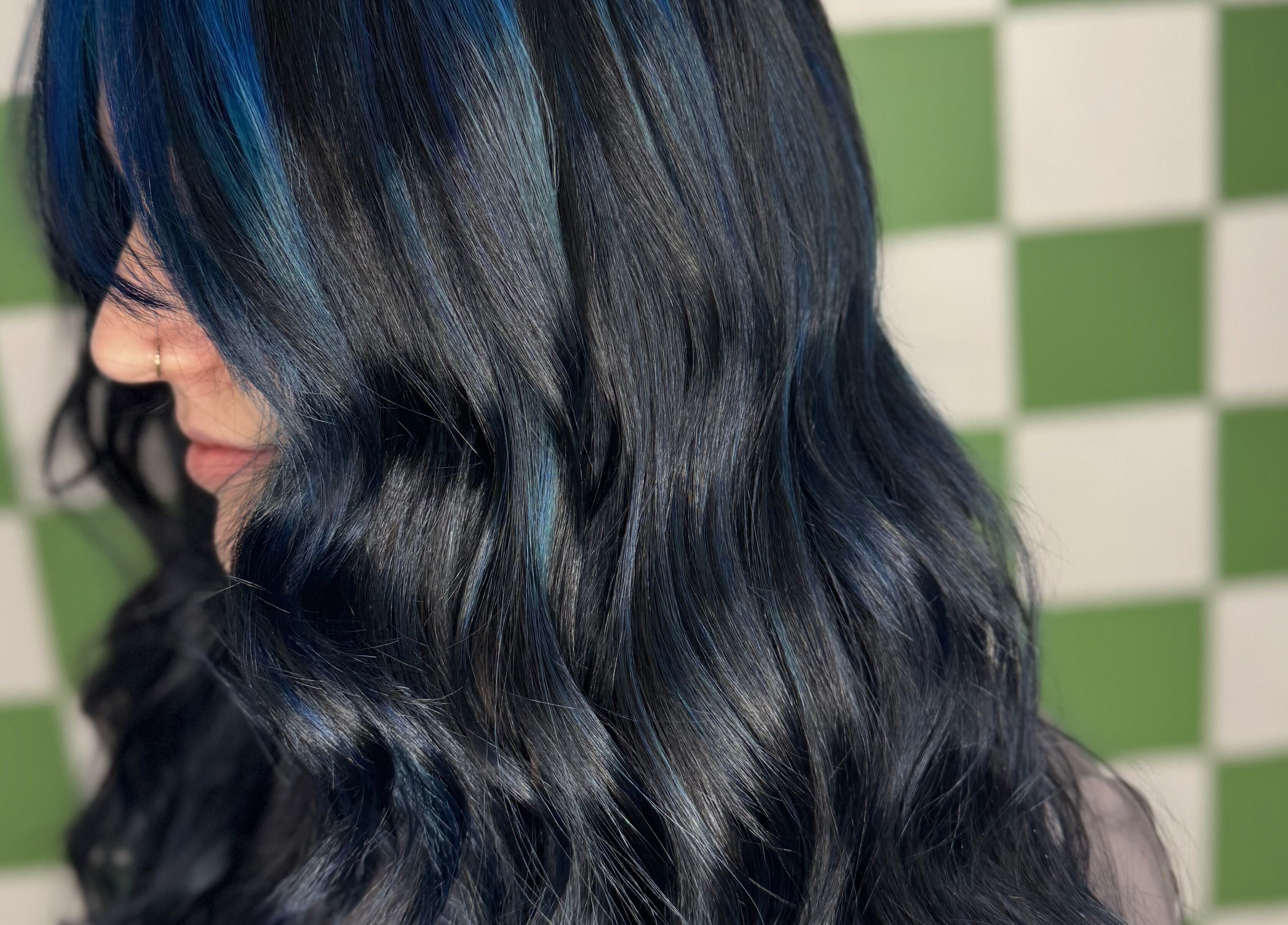 Stylish blue-black wavy hairstyle at Hair Senpai, Campbelltown, New South Wales, AU.