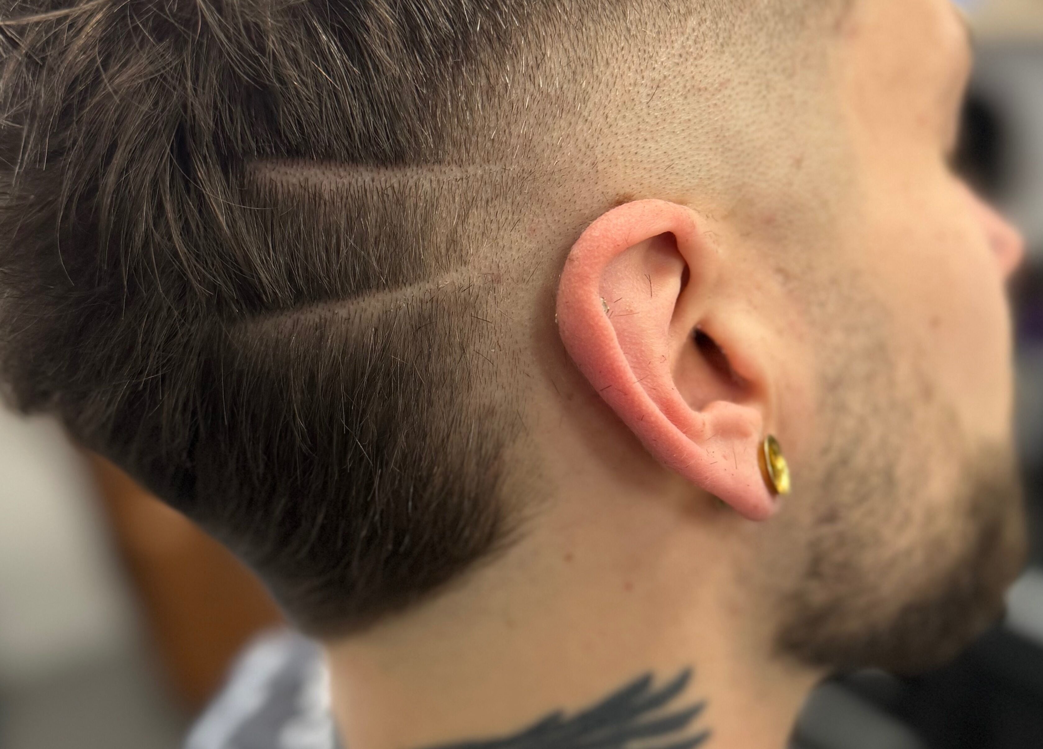 Close-up of trendy undercut hairstyle at Hair Senpai, Campbelltown, New South Wales, AU.