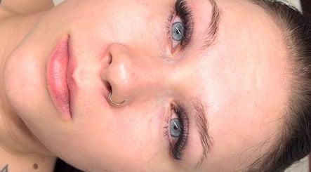 Close-up of enhanced eyelashes at Amour Esthetics LDN, London, Ontario, CA, highlighting beauty results.