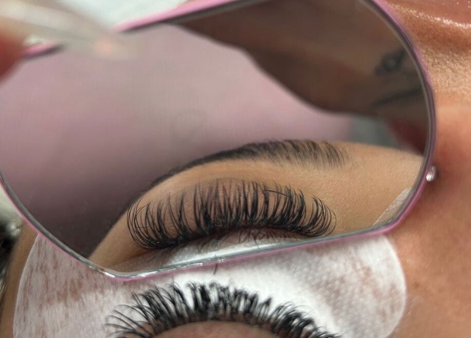 Close-up of eyelash extensions at Amour Esthetics LDN, London, Ontario, CA, reflecting precise beauty care.