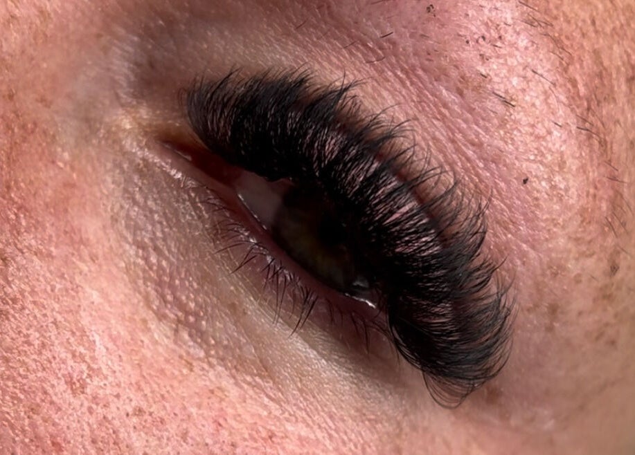 Close-up of expertly applied eyelash extensions at Amour Esthetics LDN, London, Ontario, CA.