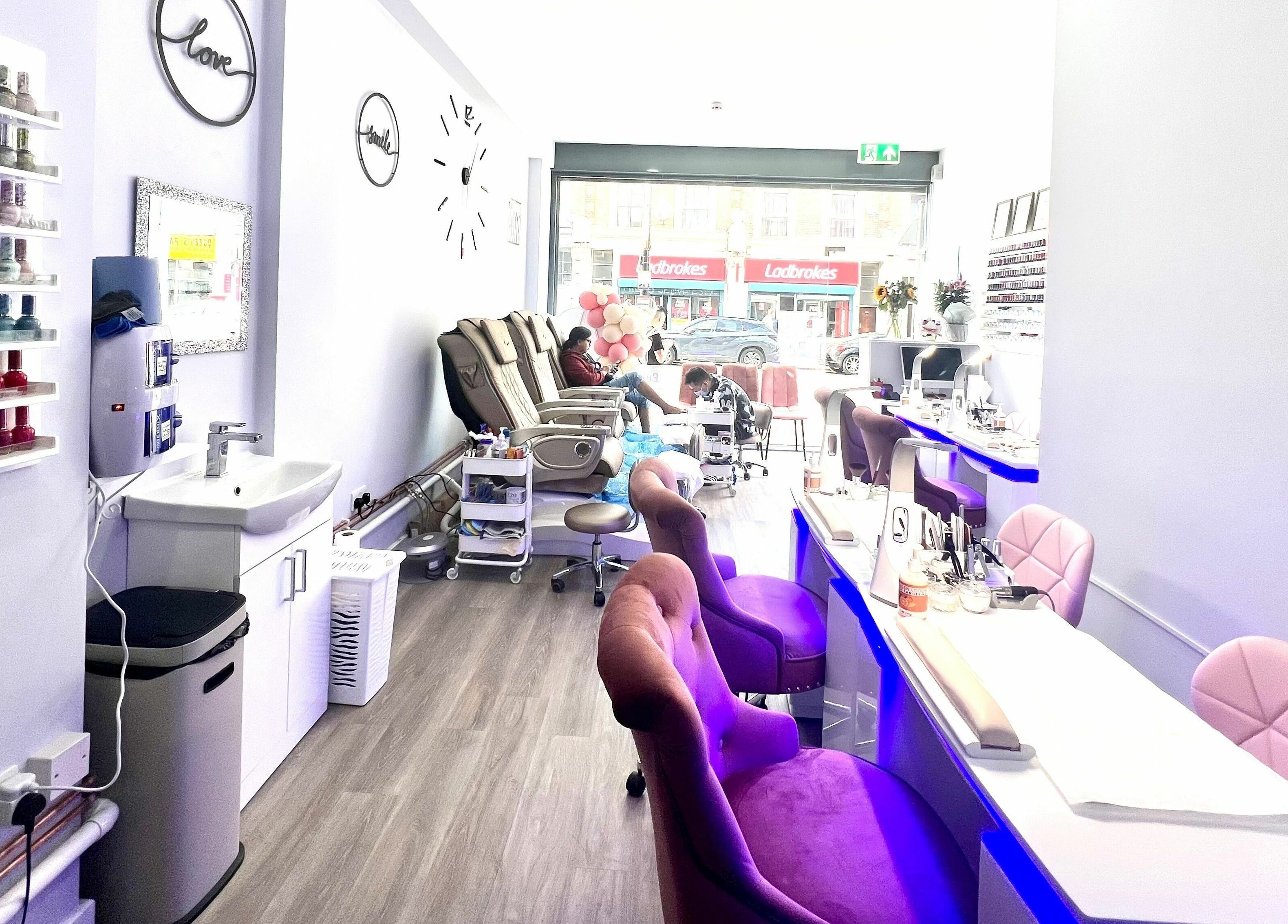 Interior of Q Nail Bar in London, England, GB with chic decor and comfortable seating for a relaxing manicure.