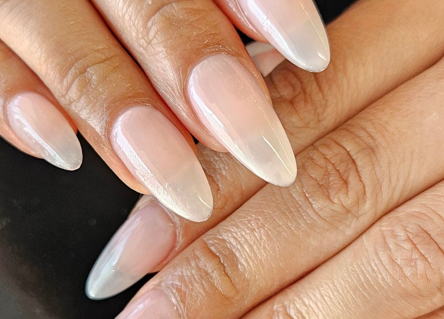Elegant manicured nails at Millionaire Nails, Revesby, New South Wales, AU showcasing glossy perfection.