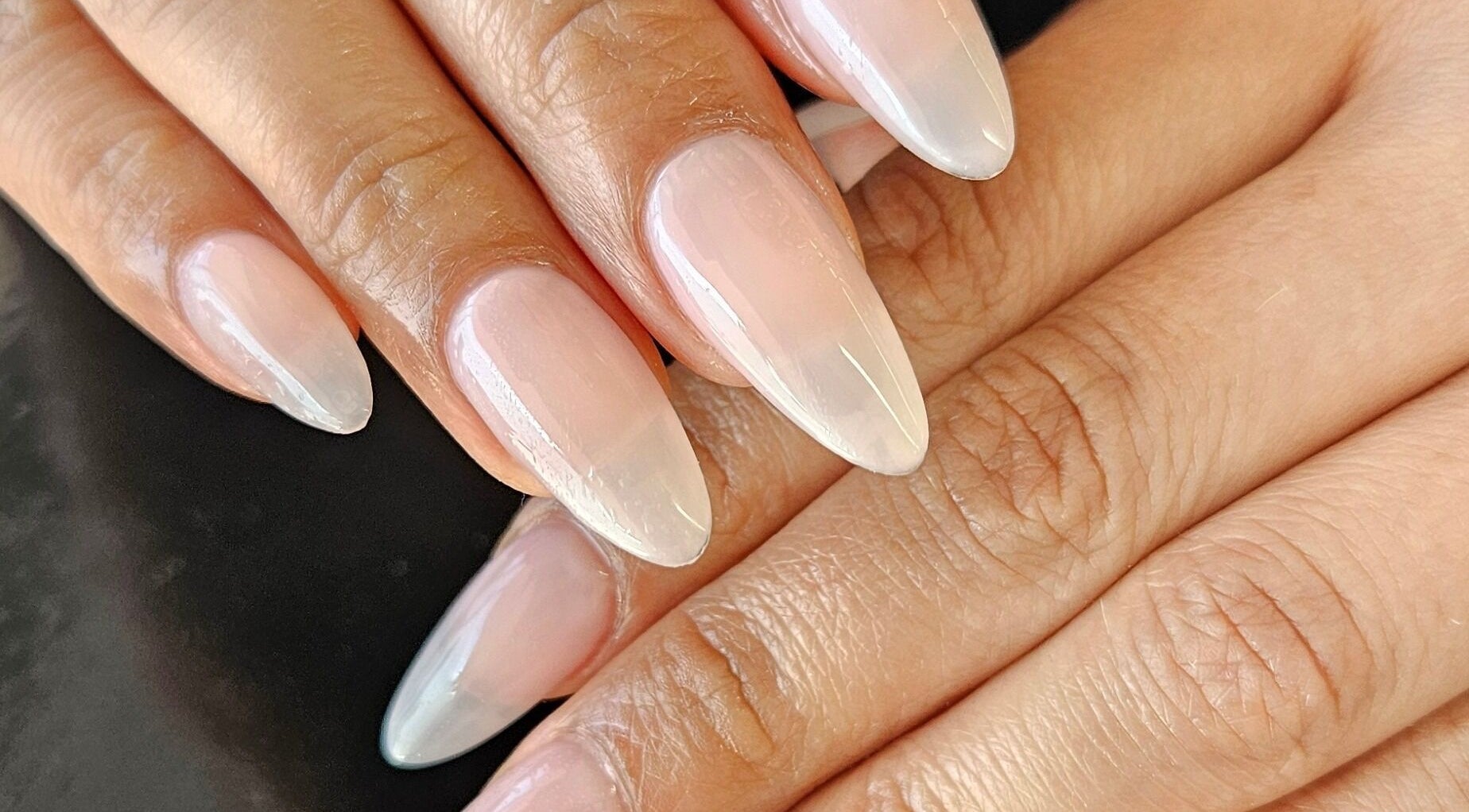 Elegant manicured nails at Millionaire Nails, Revesby, New South Wales, AU showcasing glossy perfection.