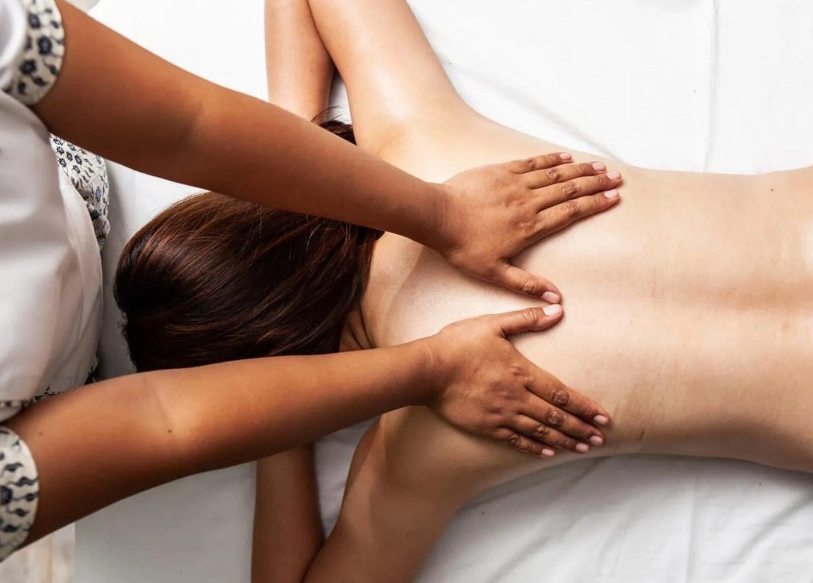 Relaxing massage at Mudara Spa in Bali, Bali, ID, showcasing soothing techniques and serene ambiance.