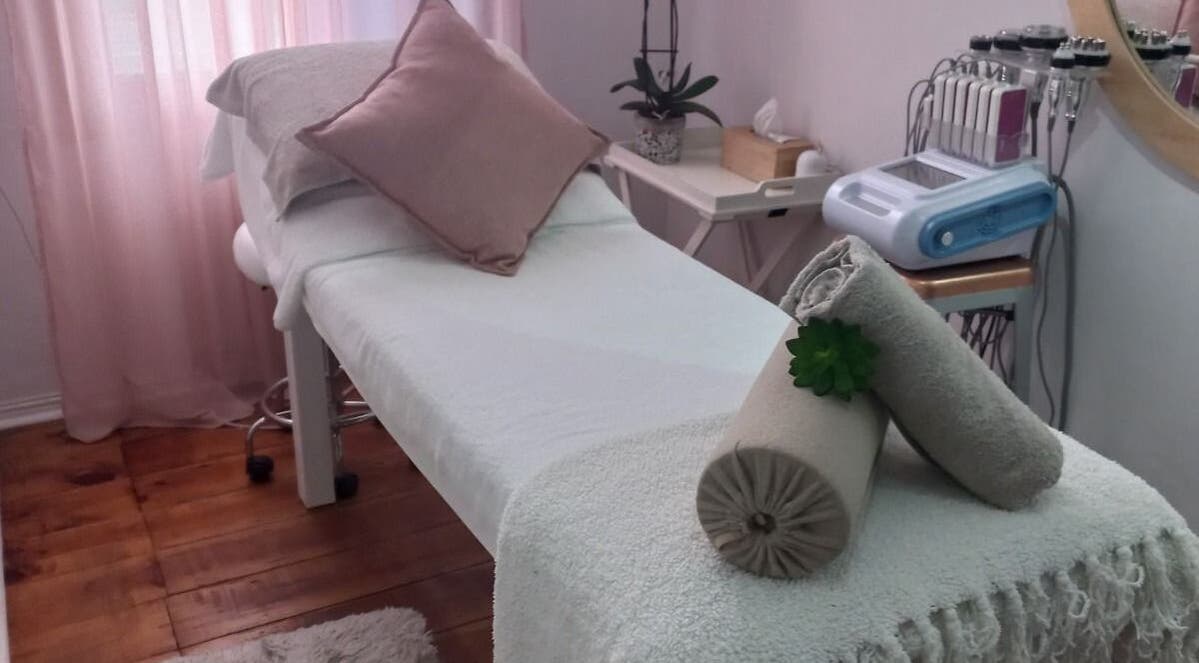 Relaxing treatment room at Sculpt & Go in Cape Town, Western Cape, ZA with soft decor and wellness equipment.