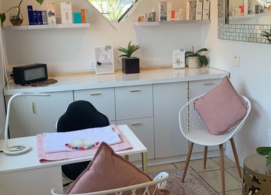 Modern beauty room at Sculpt & Go, Cape Town, Western Cape, ZA, featuring stylish decor and cozy seating.