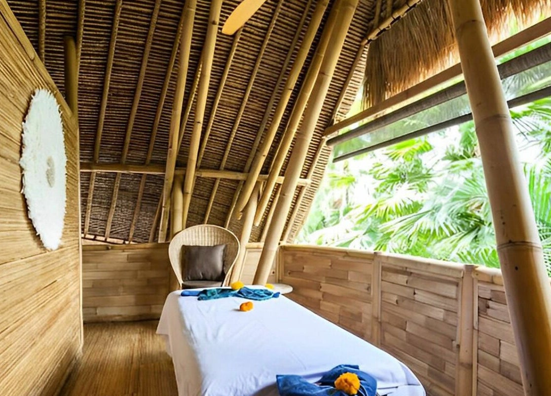 Relaxing bamboo massage room at Flying Bamboo Spa, Bali, Bali, ID, offering serene wellness experiences.
