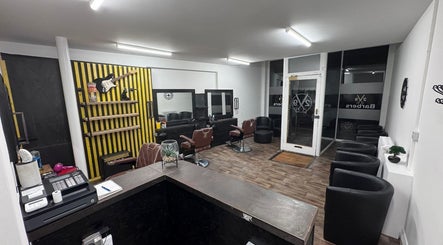 Chic interior of V29 Barbershop in Burton Upon Trent, England, GB featuring modern furnishings and décor.